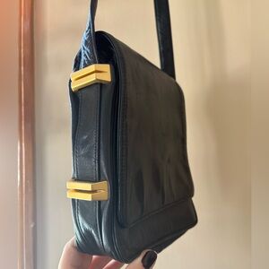Vintage Perlina New York black leather shoulder purse with gold tone accents